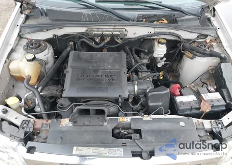 2009 Ford Escape Xlt z USA, uszkodzony, nr VIN 1FMCU93G09KA89404